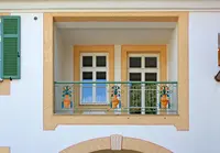 Kleiner versteckter Balkon an der Villa